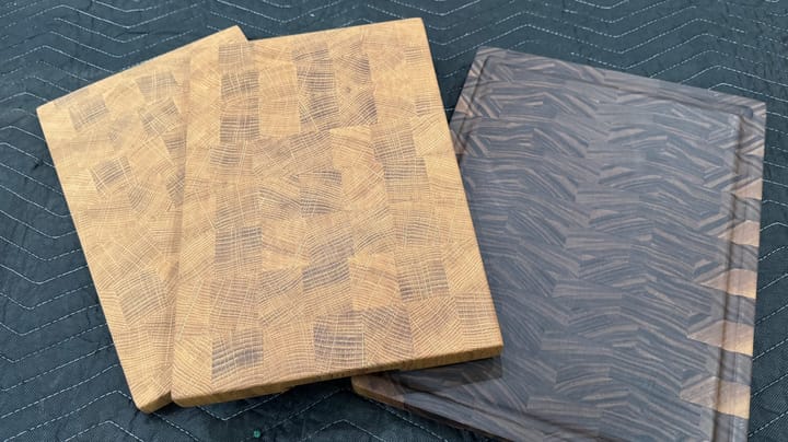 Showing two oak and one walnut end grain cutting board